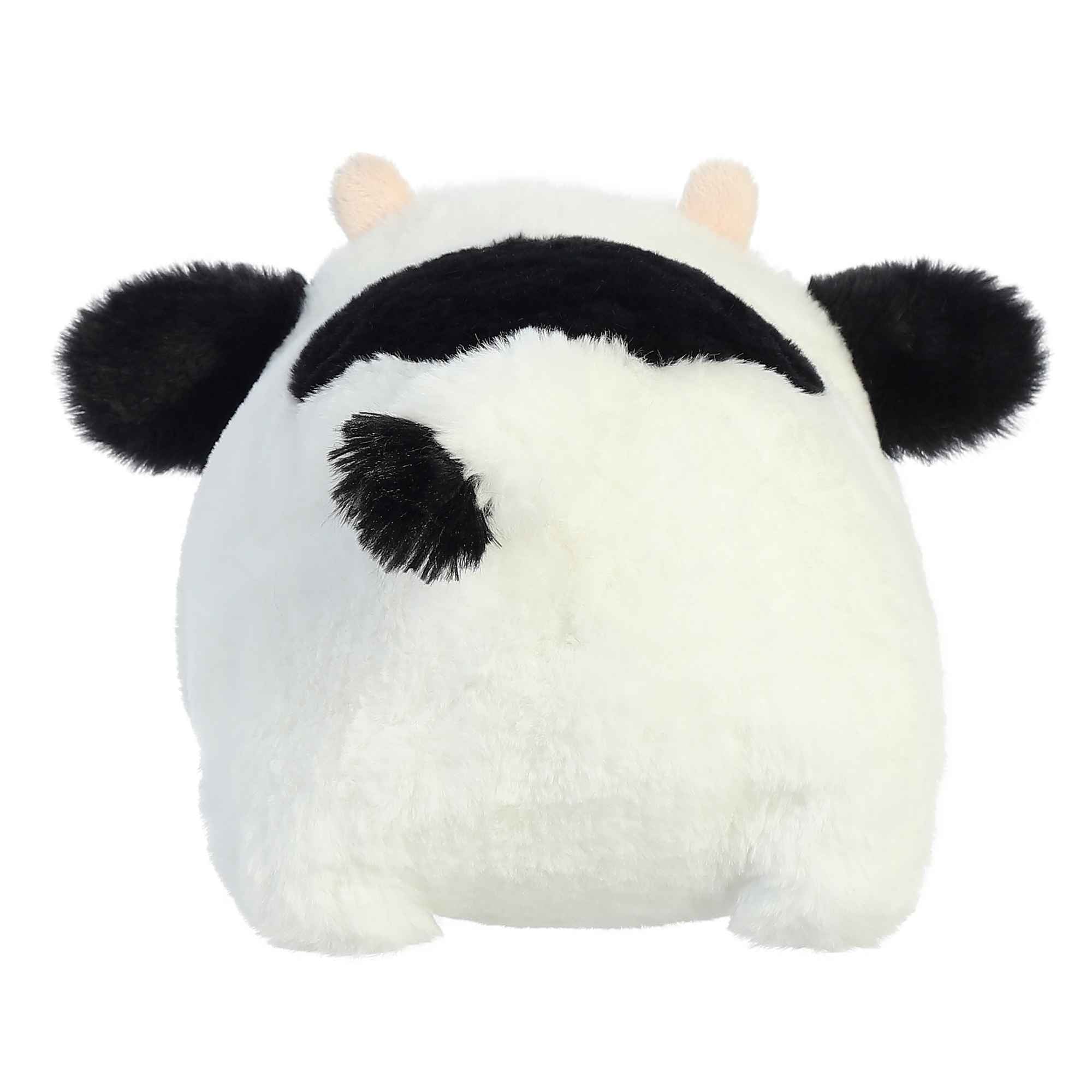 Plush toy cow on a white background