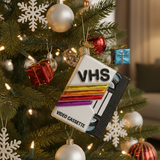 VHS video cassette ornament on a decorated Christmas tree