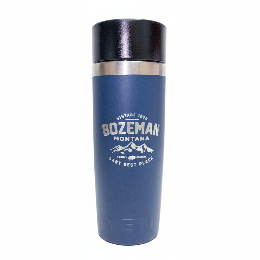Blue tumbler with 'Bozeman, Montana' text on a white background