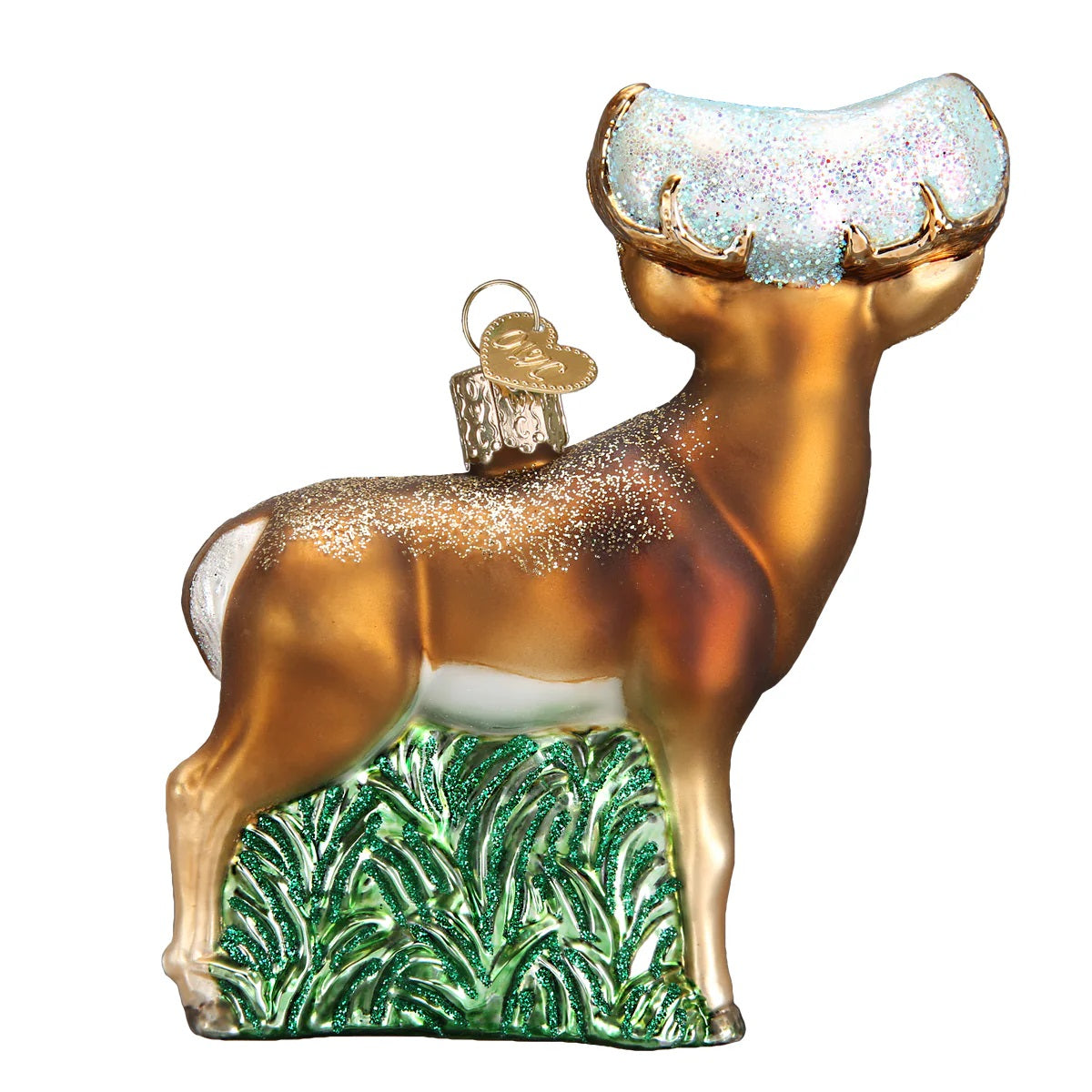 Decorative deer ornament with gold antlers and green base on a white background