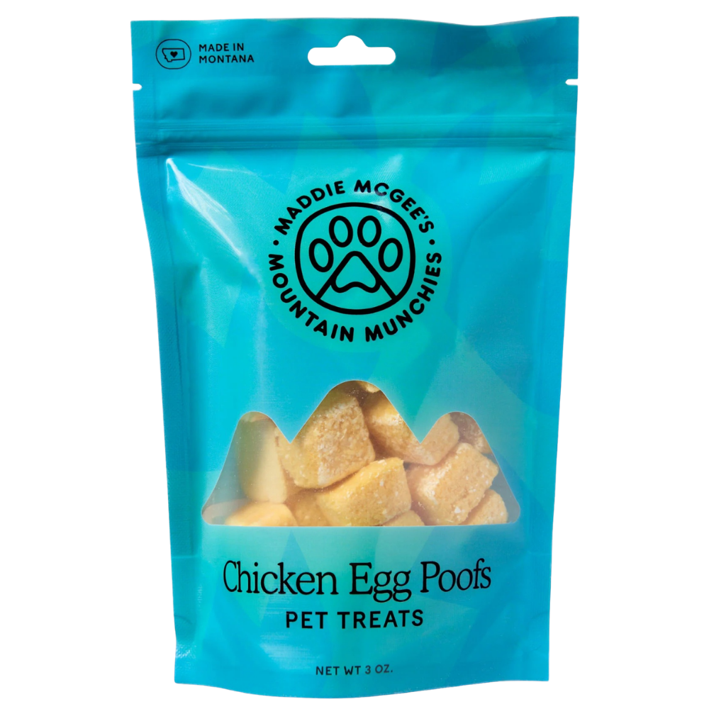 Blue package of Maddie McGee's Chicken Egg Poofs pet treats with a clear window showing the treats inside.