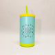 Light blue tumbler with yellow lid and bottom, featuring 'Wild Child' text and tree graphics on a white background.