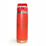Red insulated bottle with 'Montana' branding on a wooden surface.