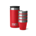 Red YETI travel mug with black lid and gray accents on a white background
