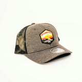 Gray trucker cap with Yellowstone National Park patch on a white background