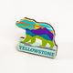 Colorful bear-shaped Yellowstone magnet on a white background