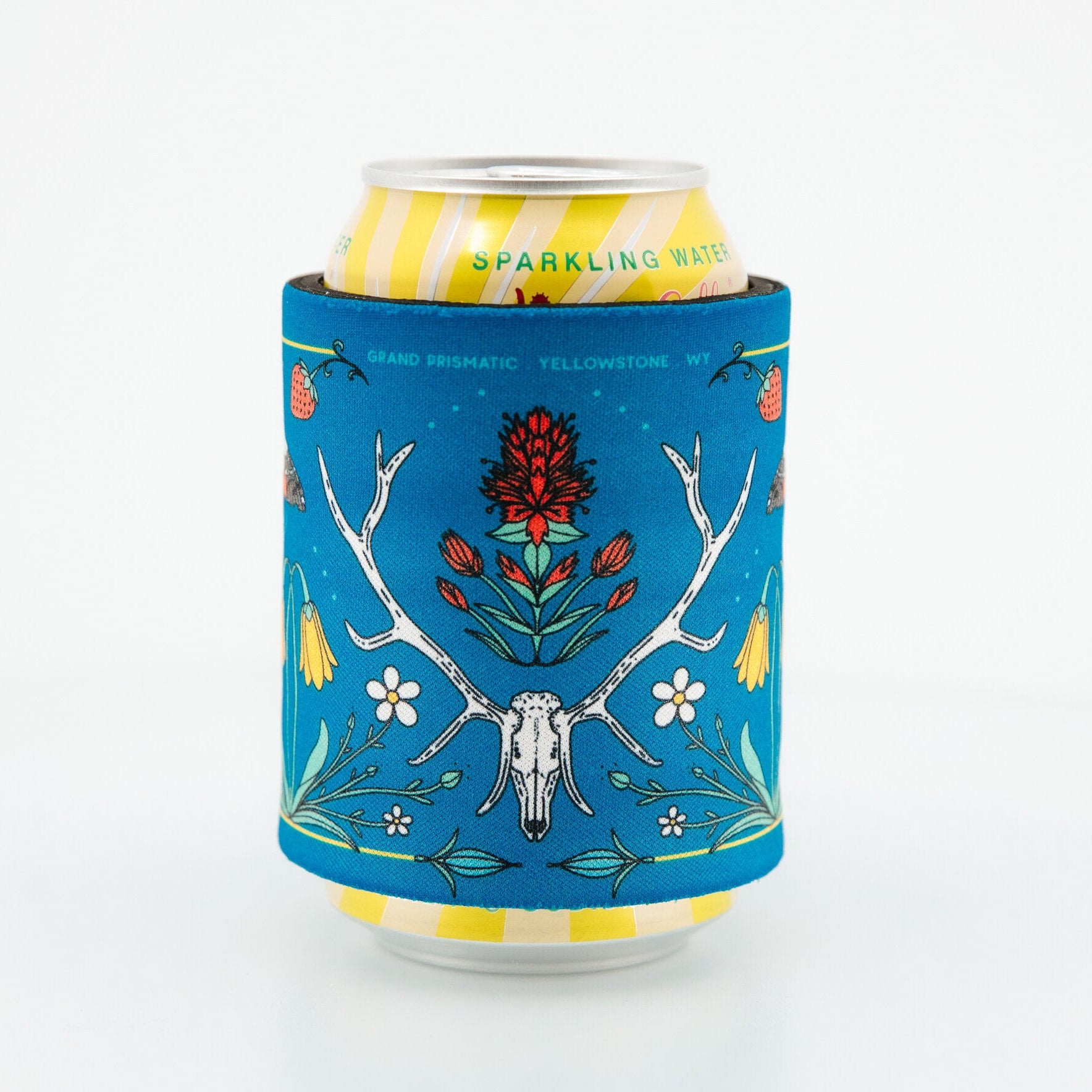 Can with a blue decorative sleeve featuring deer antlers and flowers on a white background