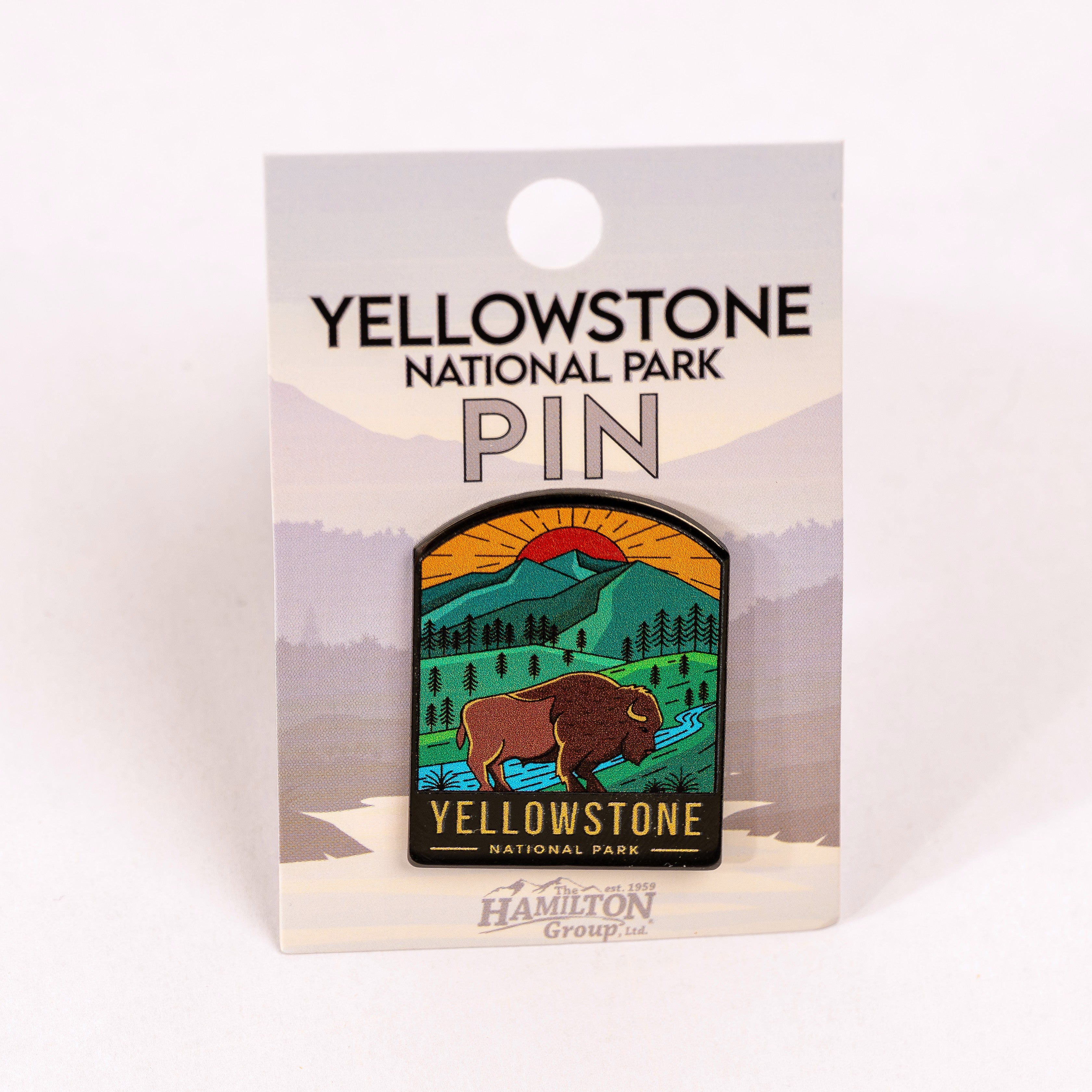 Yellowstone National Park pin on packaging with mountain and bison design