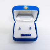 Yogo Sapphire earrings in a blue jewelry box with 'Made in Montana, USA' label.