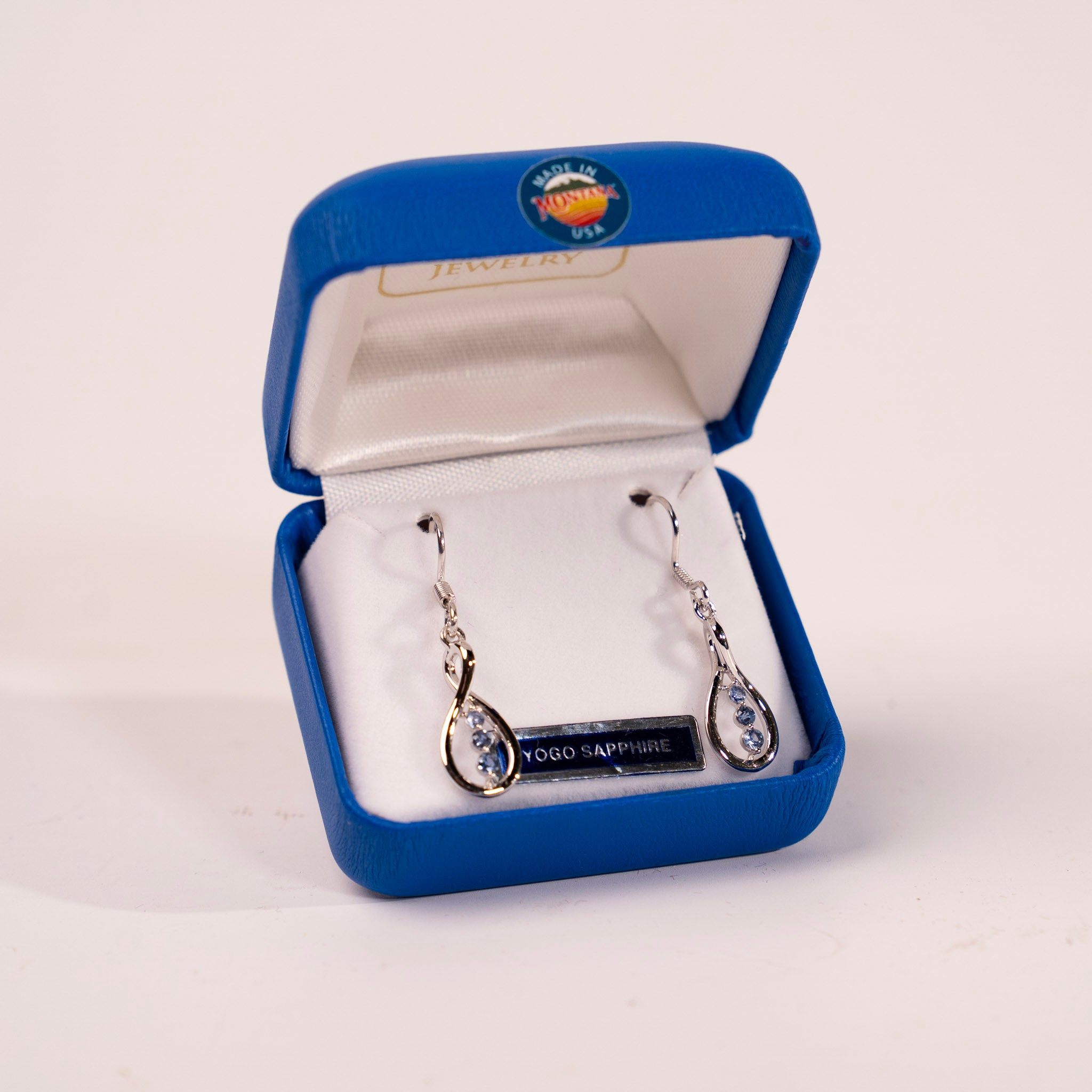 Yogo Sapphire 3 Stone Twist Earrings by Mac's Gems