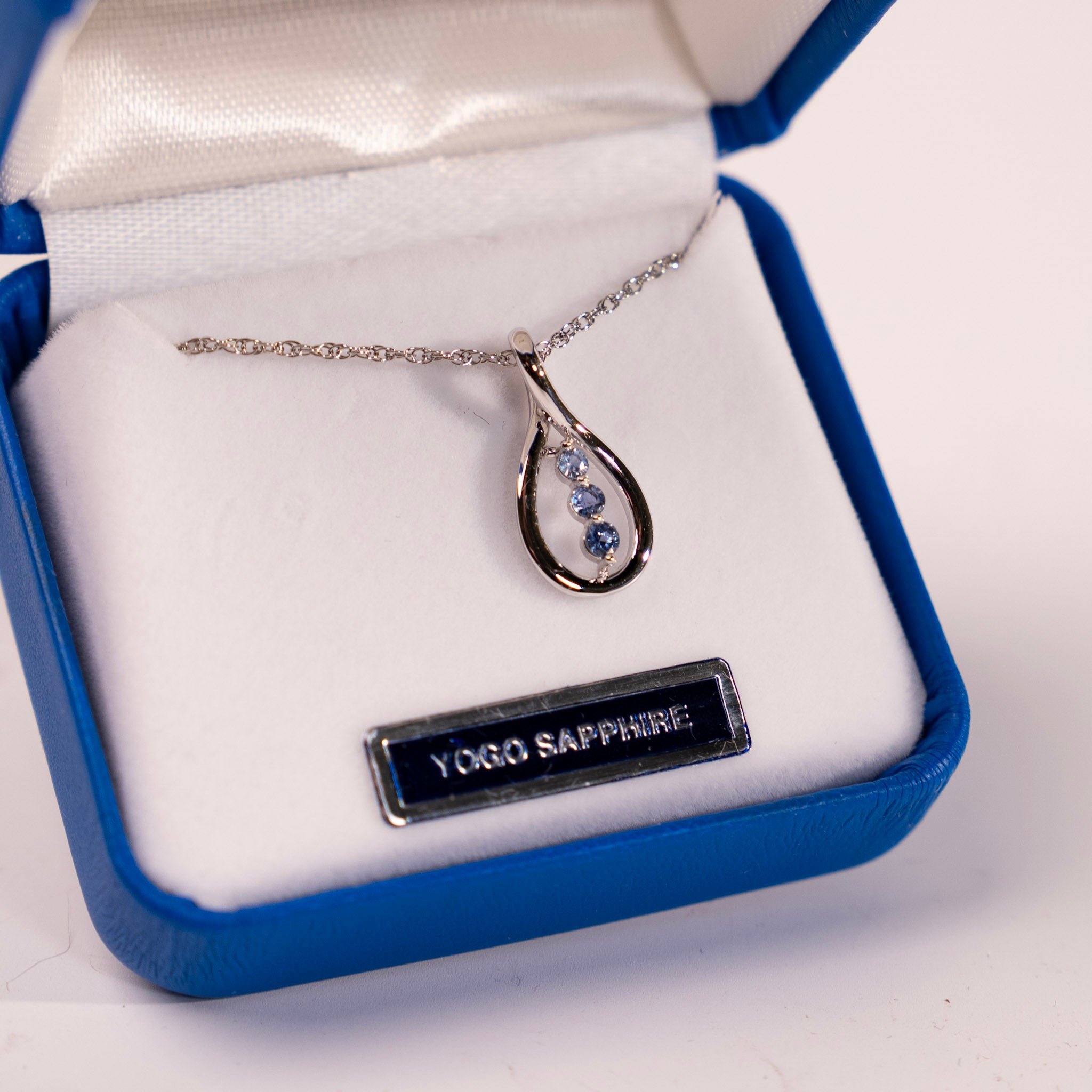 Yogo Sapphire 3 Stone Twist Pendant by Mac's Gems