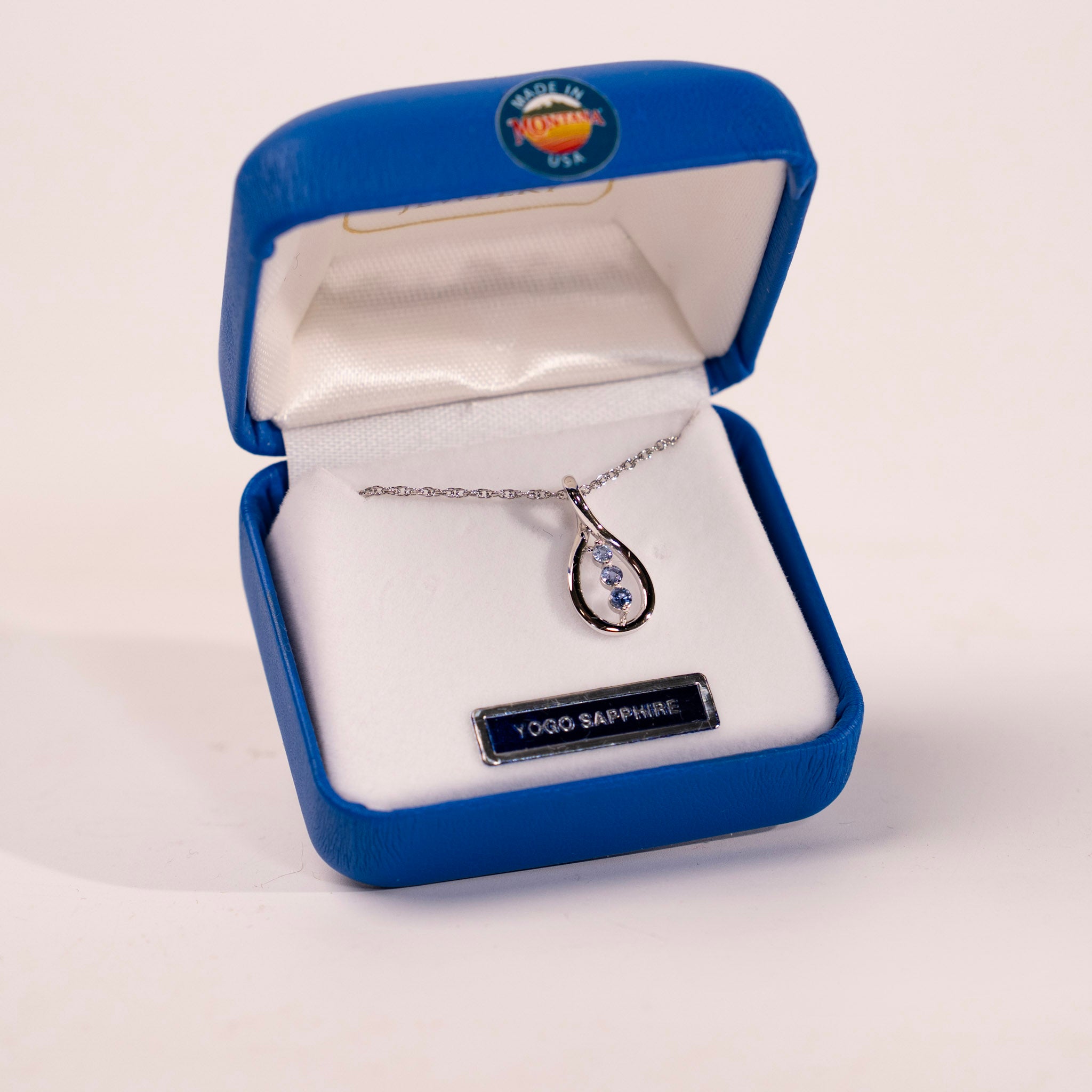 Yogo Sapphire 3 Stone Twist Pendant by Mac's Gems