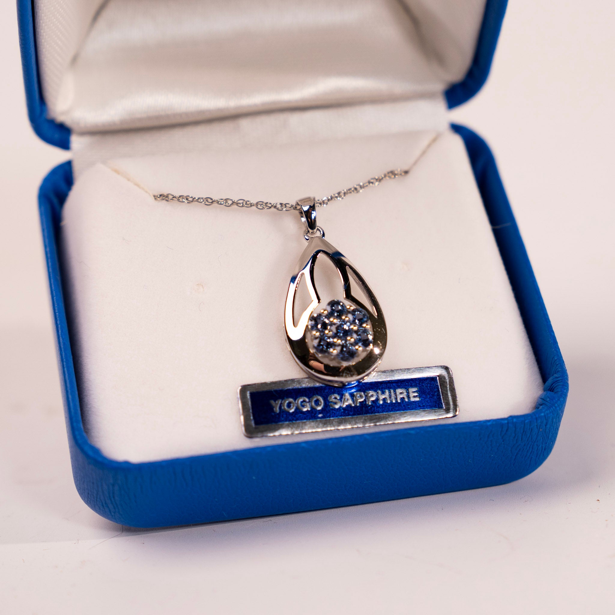 Yogo Sapphire Flower in Pear Pendant by Mac's Gems
