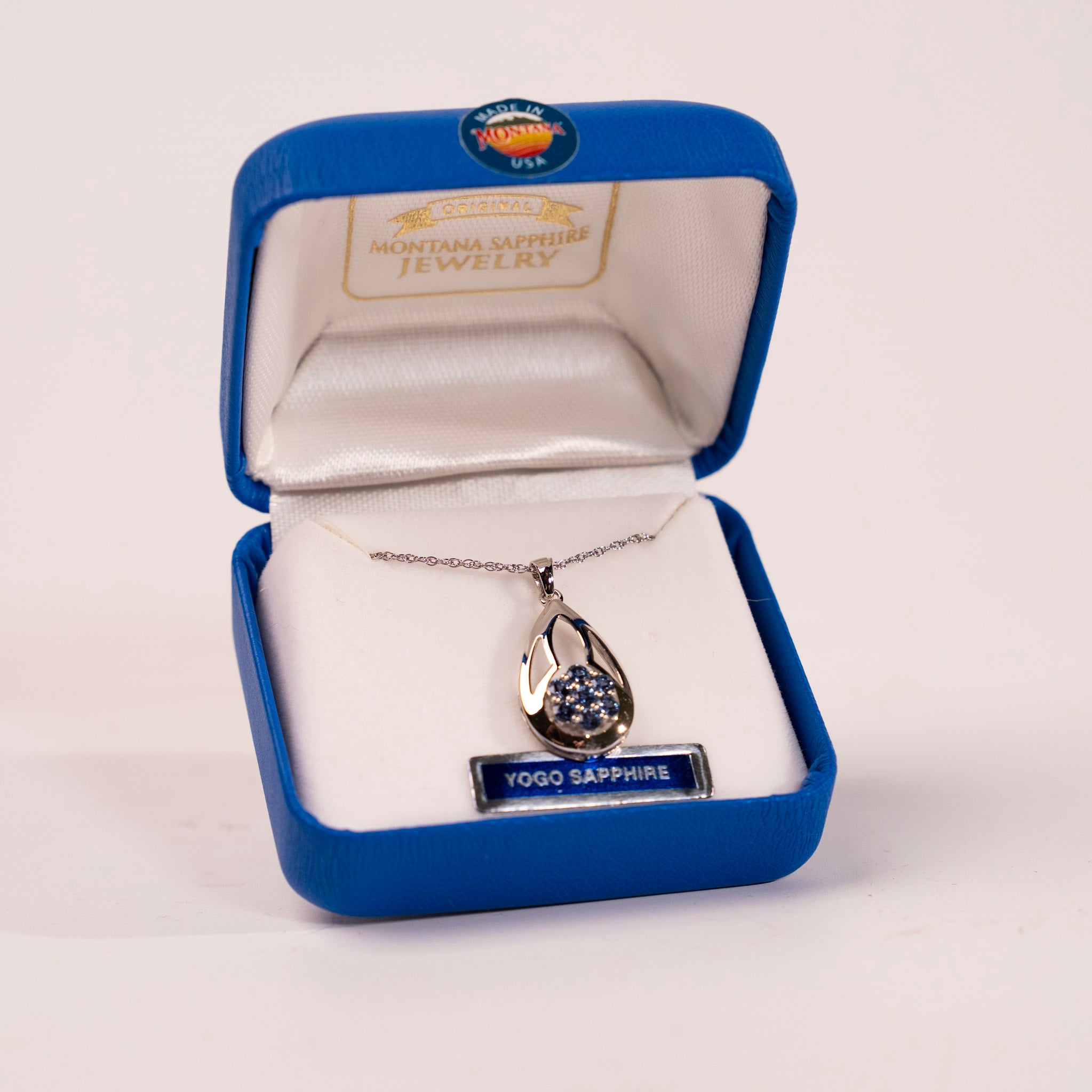 Yogo Sapphire Flower in Pear Pendant by Mac's Gems