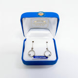 Yogo Sapphire earrings in a blue jewelry box with 'Made in Montana' label.