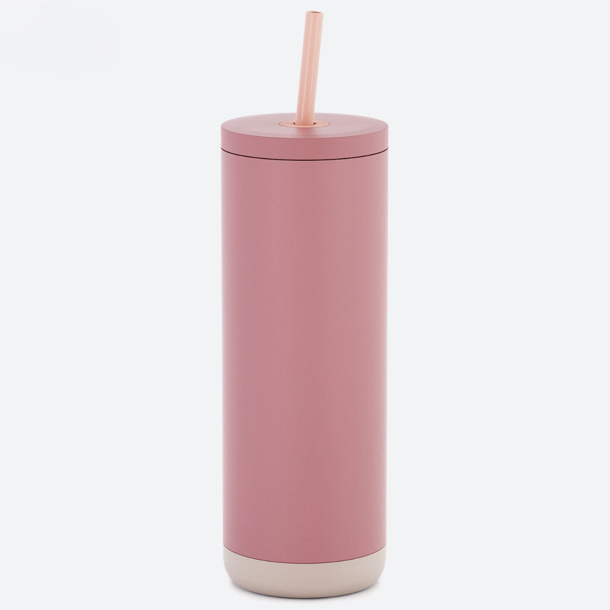 Pink tumbler with a straw on a white background