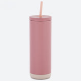 Pink tumbler with a straw on a white background