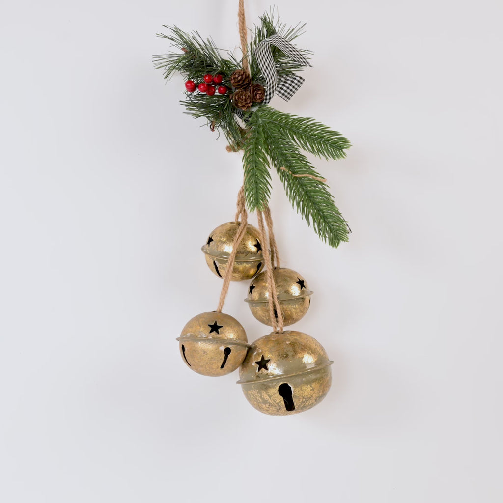 Decorate bells with greenery for Christmas