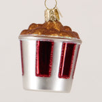 Glass ornament resembling a Kentucky Fried Chicken cup with fried chicken on top.