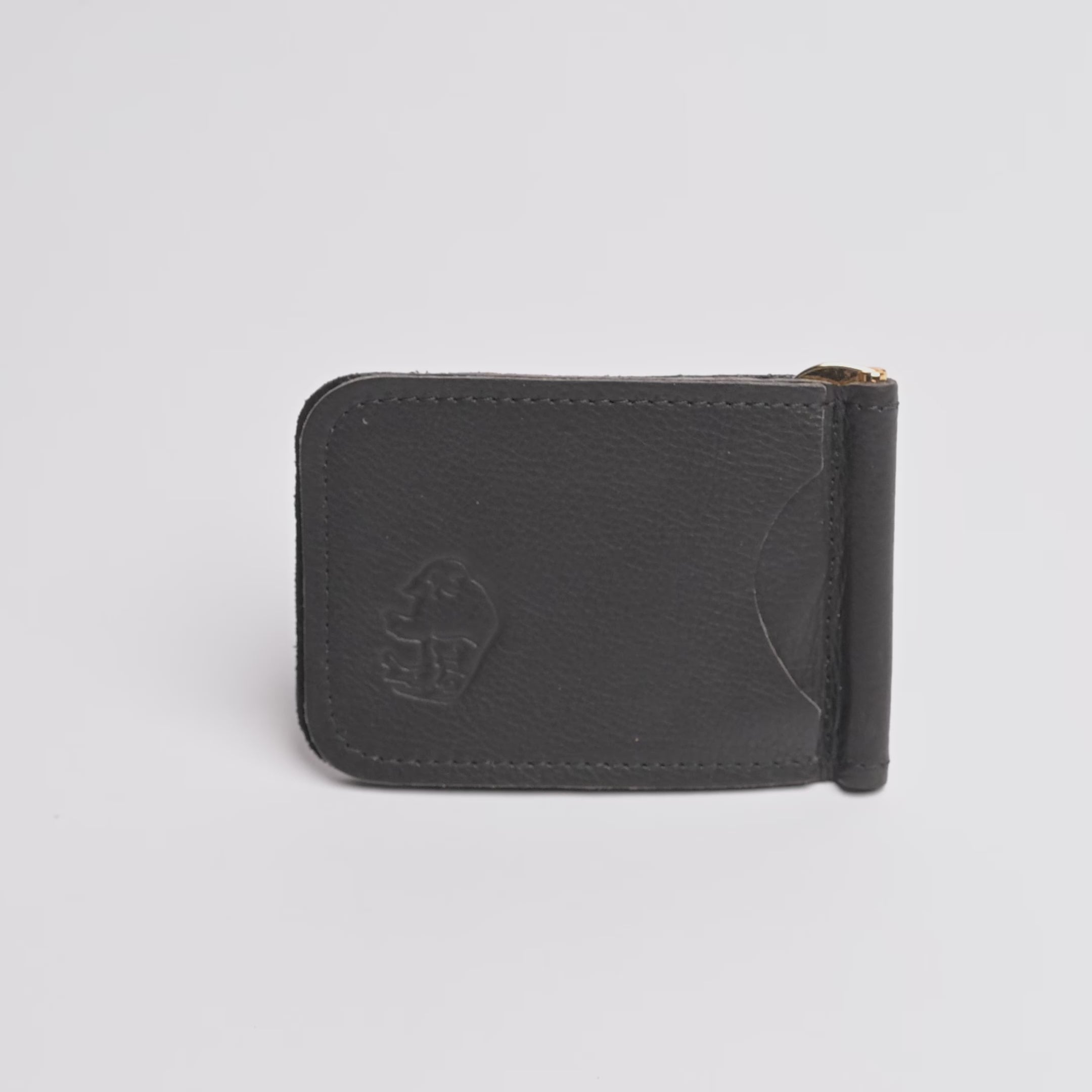 A espresso brown textured leather money clip wallet with a gold-tone metal clip and zipper pull, shown on a clean white background.