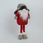 Gnome figurine with red outfit and gray hat against a white background