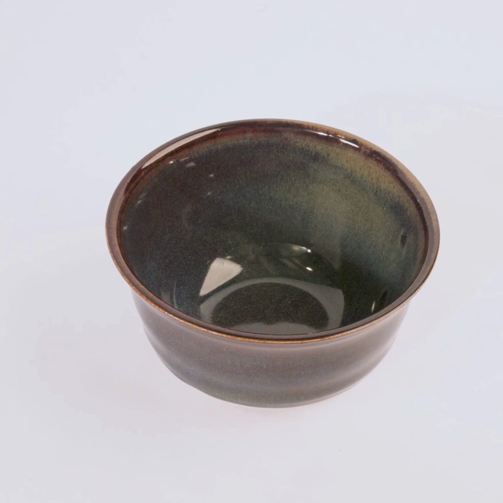 ceramic bowls with a rustic finish on white background