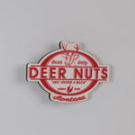 Deer Nuts logo magnet with red text on a white background