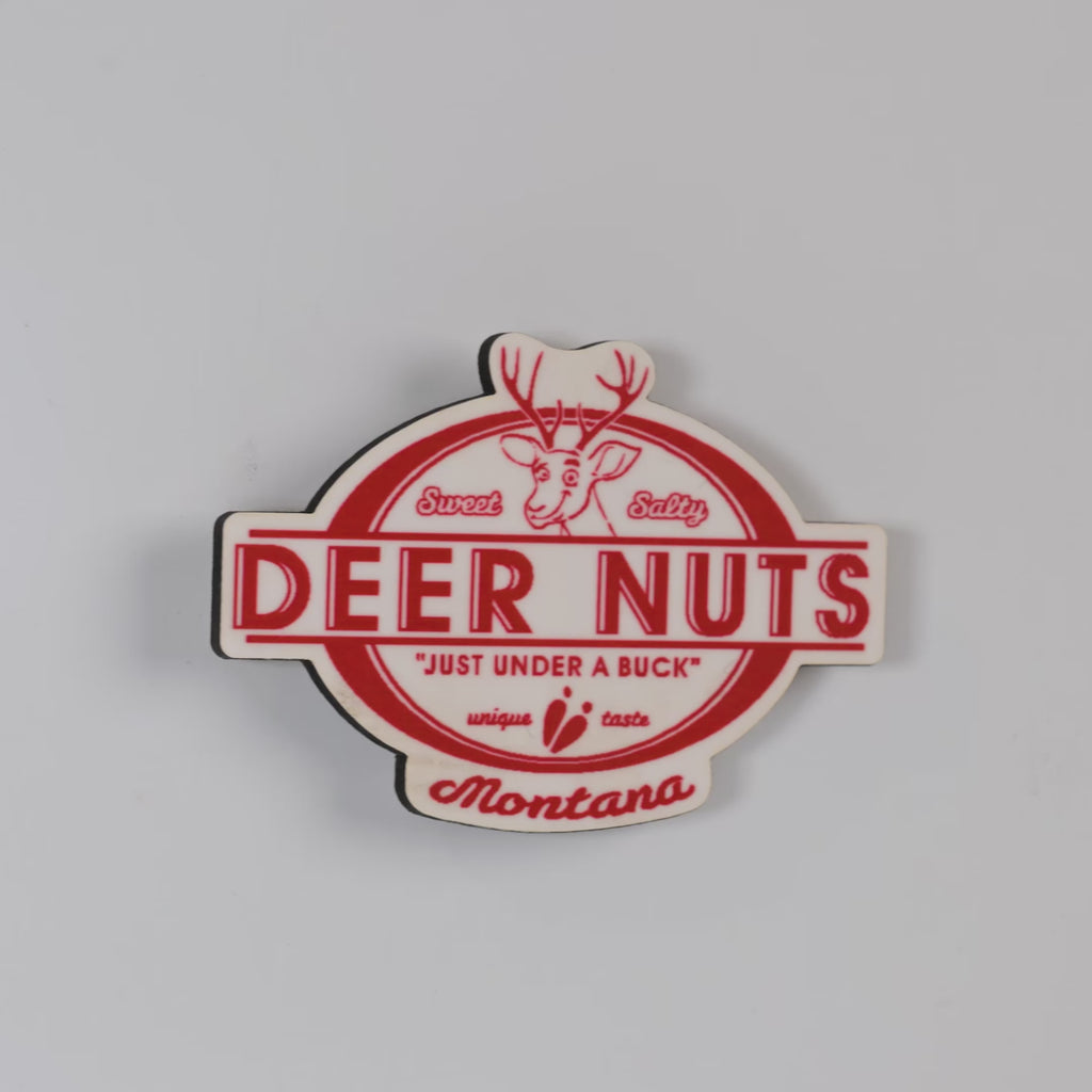 Deer Nuts logo magnet with red text on a white background