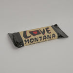 Chocolate bar with 'Love Montana' packaging on a white background