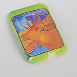 Colorful magnet with a elk design on a white background