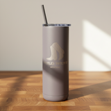 Gray tumbler with a logo on a wooden surface