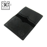 A black leather card case with a logo embossed on the bottom right, displayed against a white background with a '30th Anniversary' logo above.