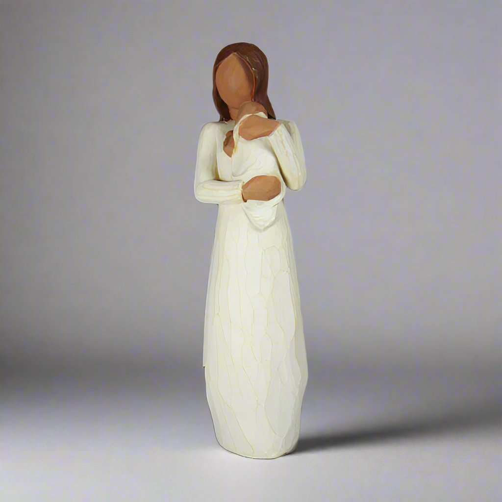 The Angel of Mine Willow Tree Figurine by Susan Lordi is a beautiful representation of the sensory moment that is holding a new born. This would be a great gift to give a new mother. 