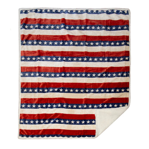 Americana Sherpa Throw Blanket by Carstens features red white and blue stripes with white stars inside the blue stripes 