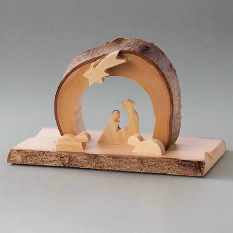 The Arched Grotto with Holy Family Under Star by Earthwood is made out of authentic olive wood from the birthplace of our savior.