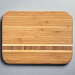 Want to make an impression when you're cutting and serving? Look no further than the Barbados Bar Cutting Board by Totally Bamboo!