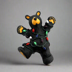 Bearfoots Hap Wrapped in Lights by Big Sky Carvers