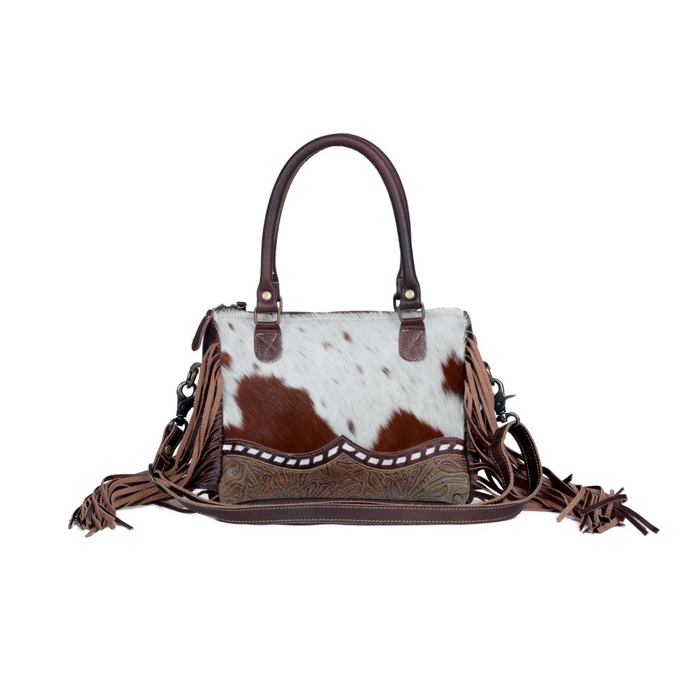 The Brown Freckles Concealed Carry Bag by Myra Bag is an elegant hair designer bag with two adaptable leather straps, crafted to meet your style and convenience! 