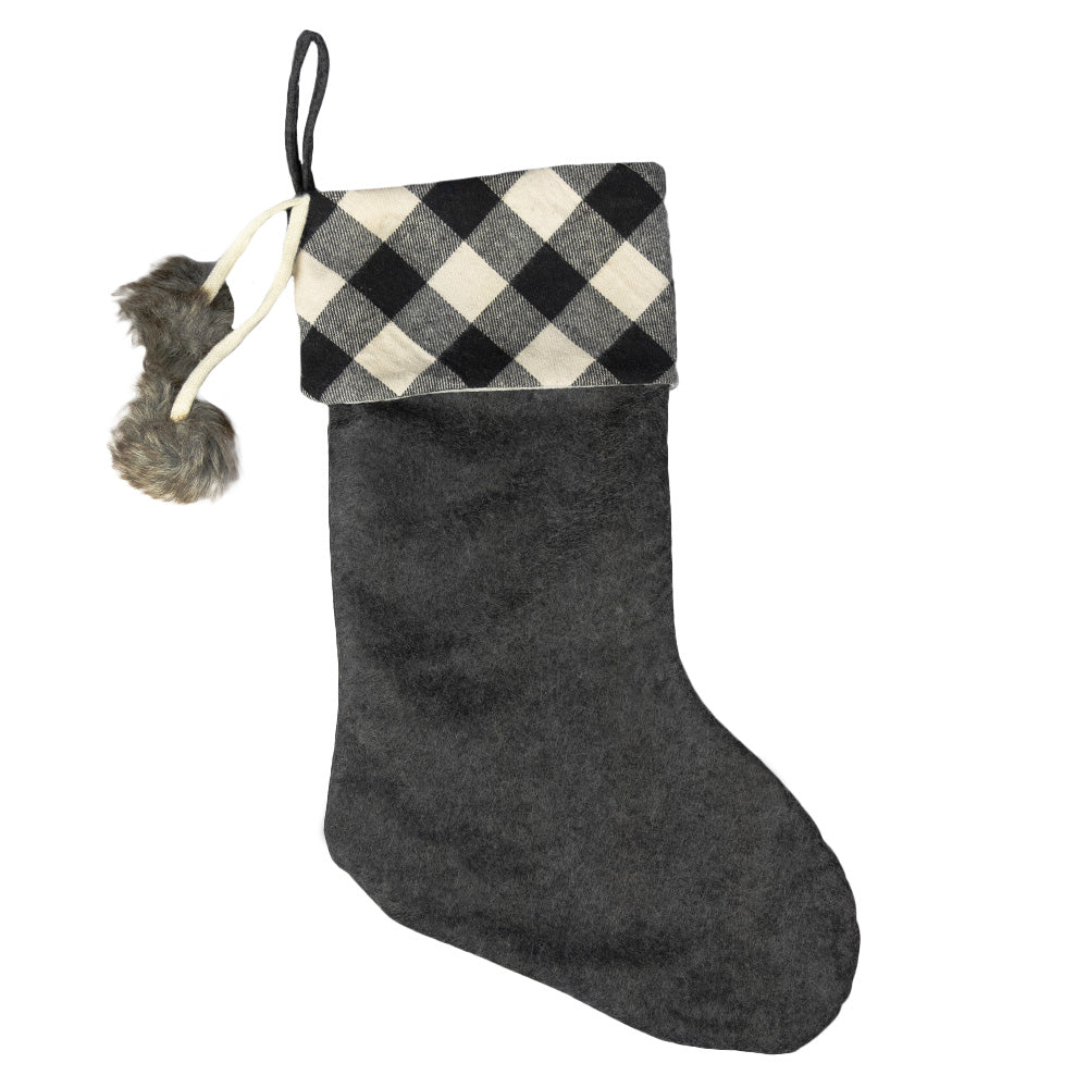 Add a classic favorite to your holiday decor with this Buffalo Check Fabric Stocking by Transpac Imports. 