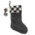 Add a classic favorite to your holiday decor with this Buffalo Check Fabric Stocking by Transpac Imports. 