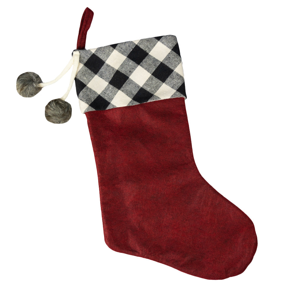Add a classic favorite to your holiday decor with this Buffalo Check Fabric Stocking by Transpac Imports. 