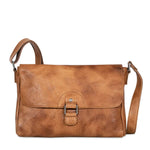 The Buffed Leather Olivia Crossbody Bag by Jack Georges is made from hand-waxed buffalo leather that builds a rich patina as it ages.