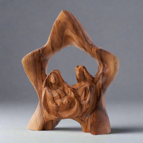 Holy Family Carved Under Star by Earthwood