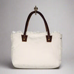 The Charming White Small Crossbody Bag by Myra Bags is a great choice if you want to make a style statement with an all weather bag!