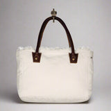 The Charming White Small Crossbody Bag by Myra Bags is a great choice if you want to make a style statement with an all weather bag!