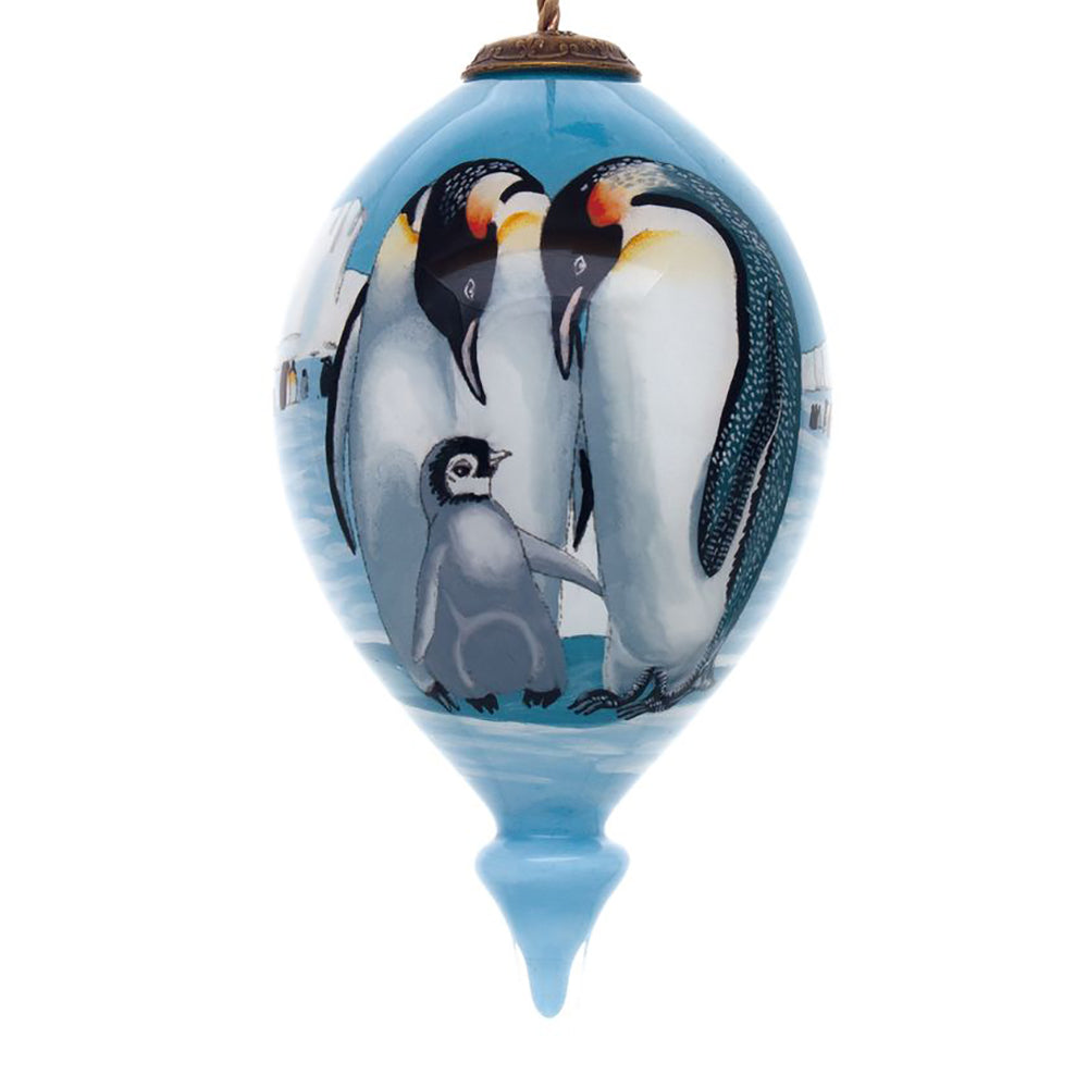 The Persis Clayton Emperor Family Christmas Ornament by Inner Beauty reminds everyone to stay warm this holiday season!