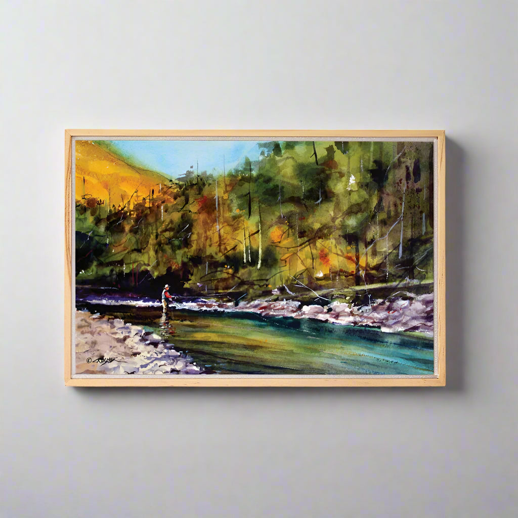 The Dean Crouser Big Wood River Framed Canvas by Demdaco is a stunning watercolor fishing scene straight from the artistic mind of Dean Crouser himself!