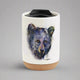 Enjoy the colorful and stylish art of Dean Crouser while you sip a warm drink with the Dean Crouser Cork Bottom Bone Tumbler by Demdaco.