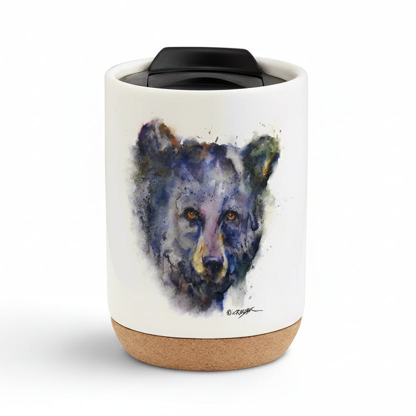 Enjoy the colorful and stylish art of Dean Crouser while you sip a warm drink with the Dean Crouser Cork Bottom Bone Tumbler by Demdaco.