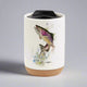 Enjoy the colorful and stylish art of Dean Crouser while you sip a warm drink with the Dean Crouser Cork Bottom Bone Tumbler by Demdaco.